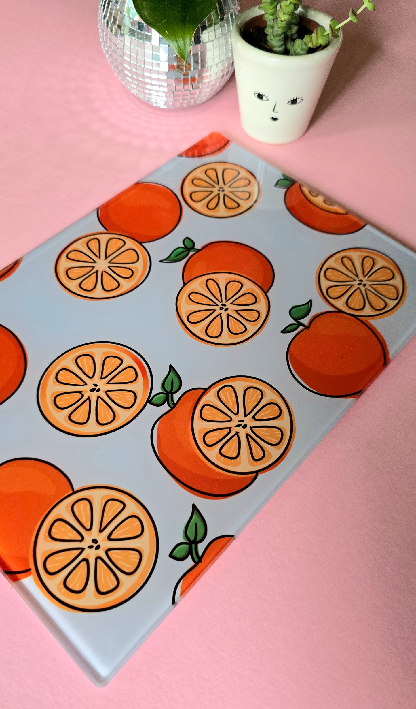 Fruity Oranges On Blue Glass Chopping Board