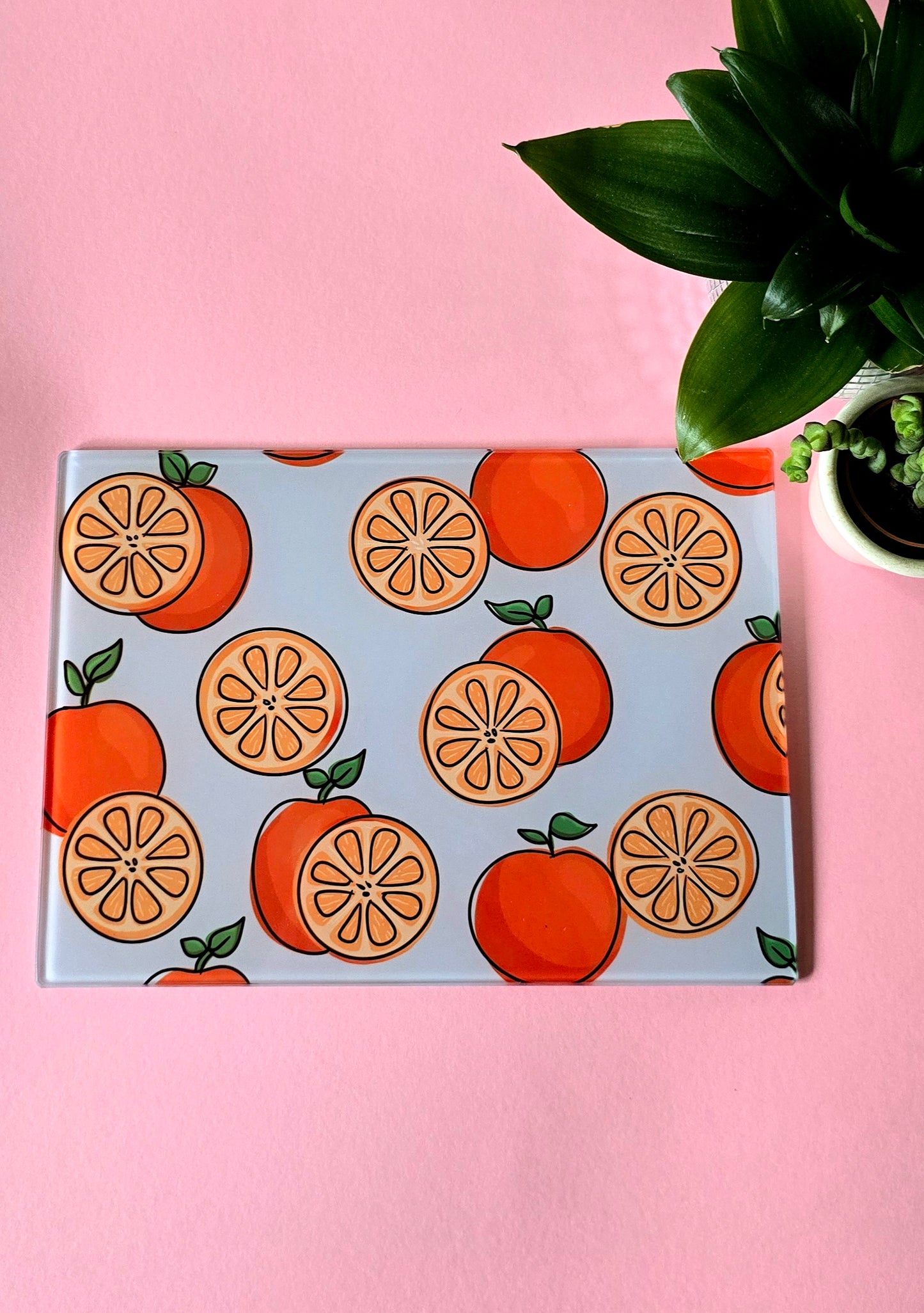 Fruity Oranges On Blue Glass Chopping Board