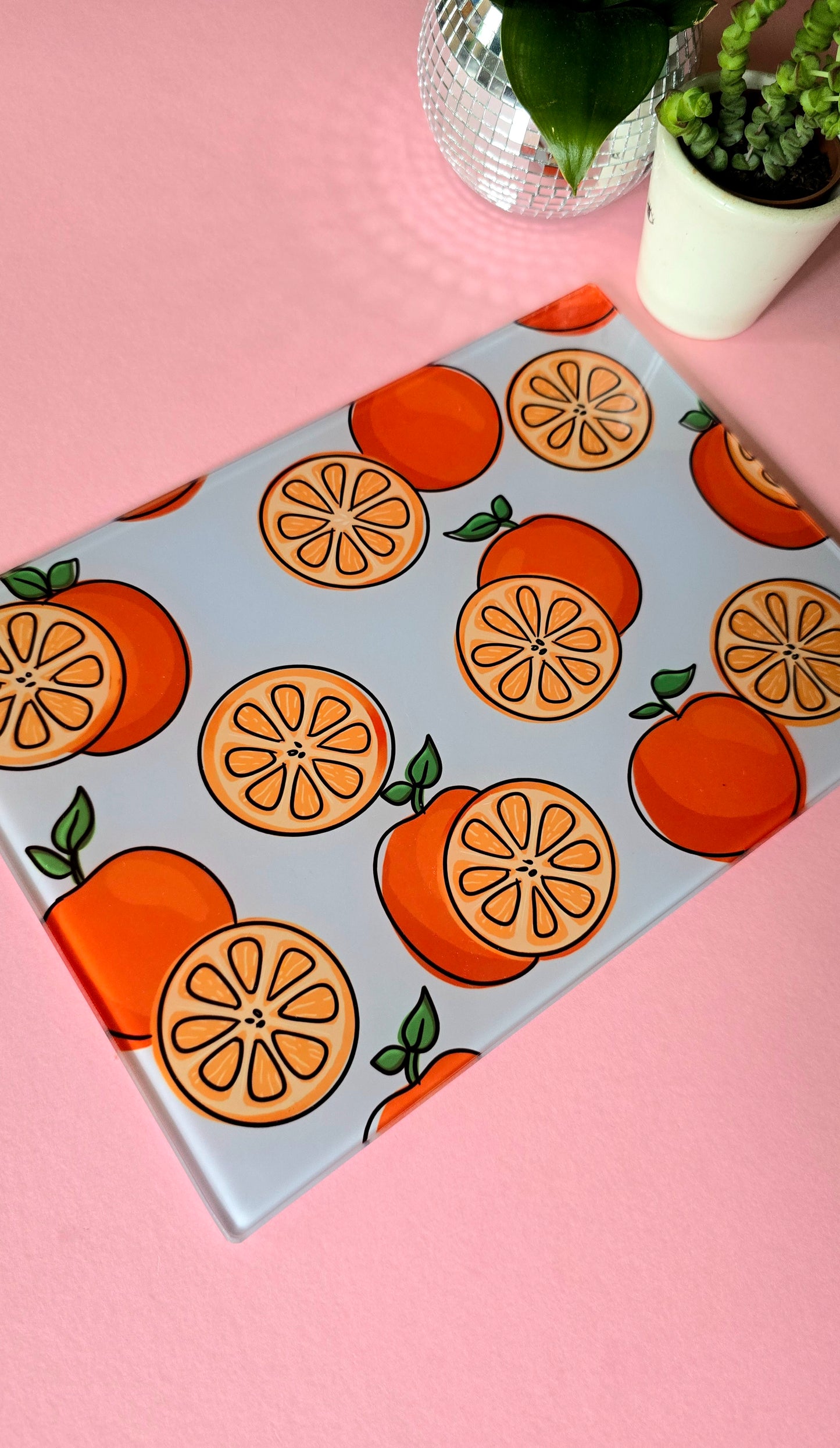Fruity Oranges On Blue Glass Chopping Board