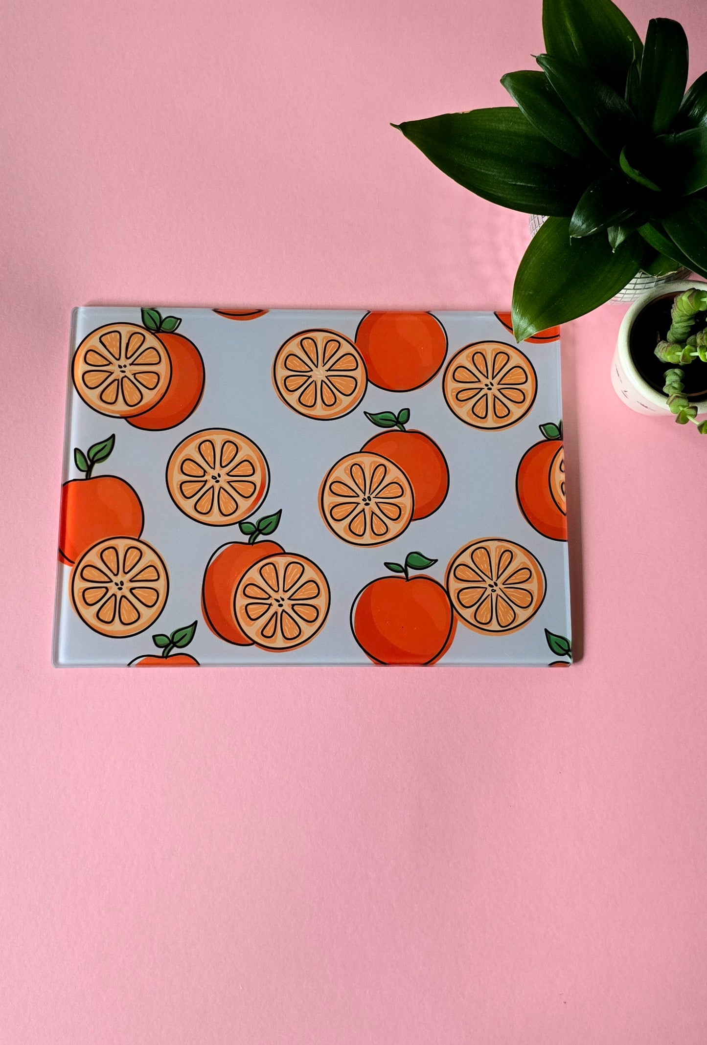 Fruity Oranges On Blue Glass Chopping Board