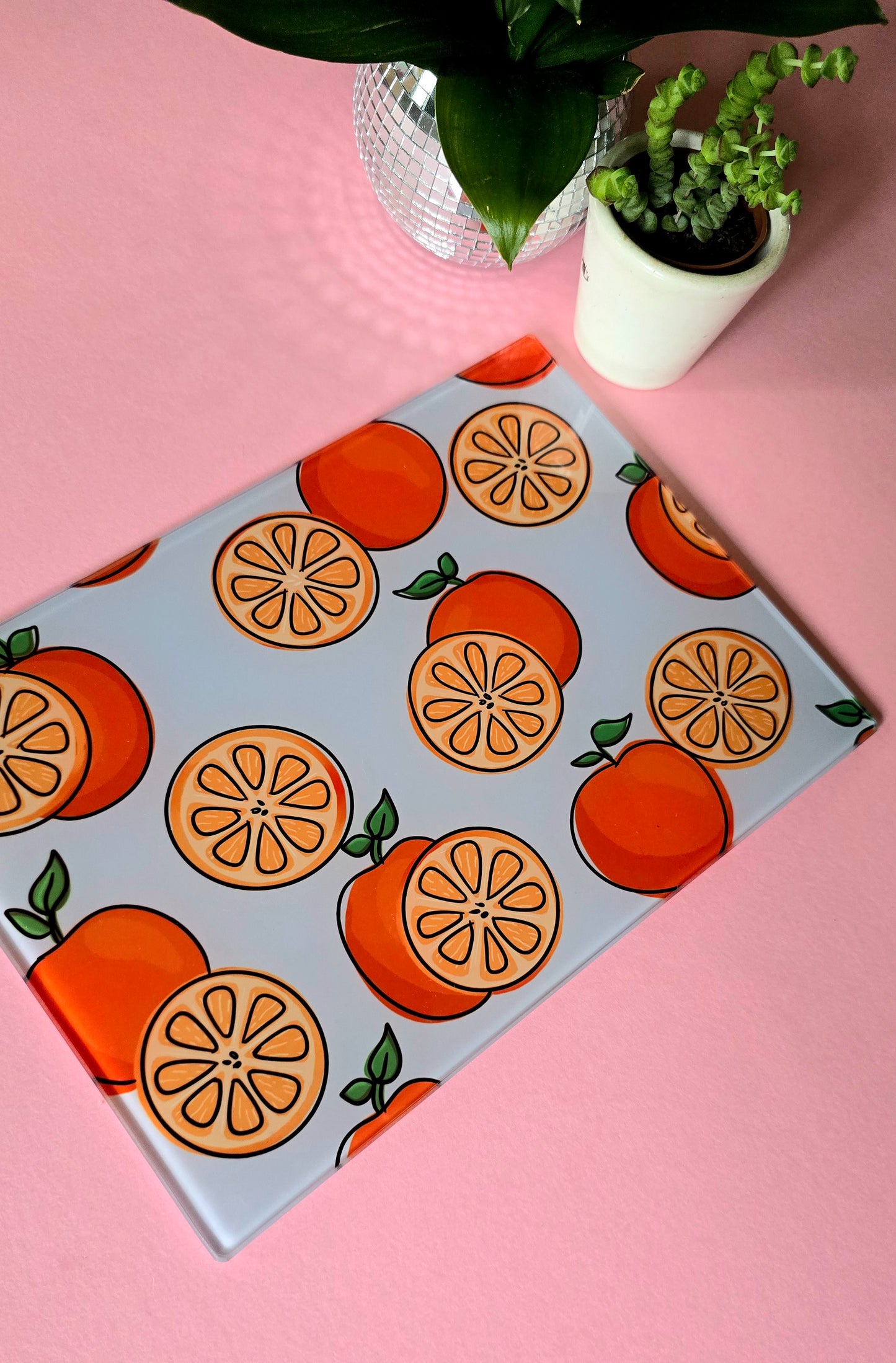Fruity Oranges On Blue Glass Chopping Board
