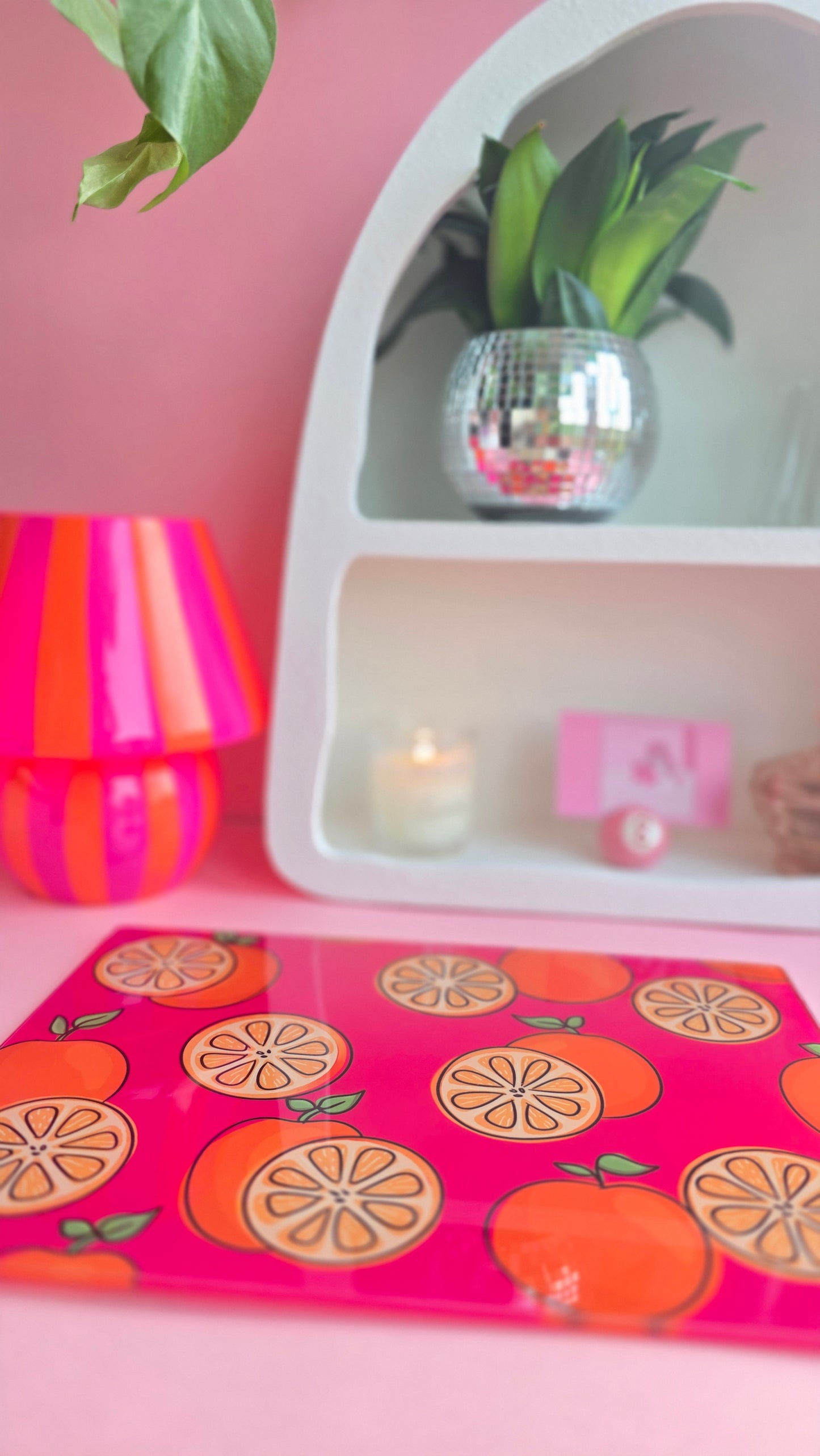 Fruity Oranges On Pink Glass Chopping Board