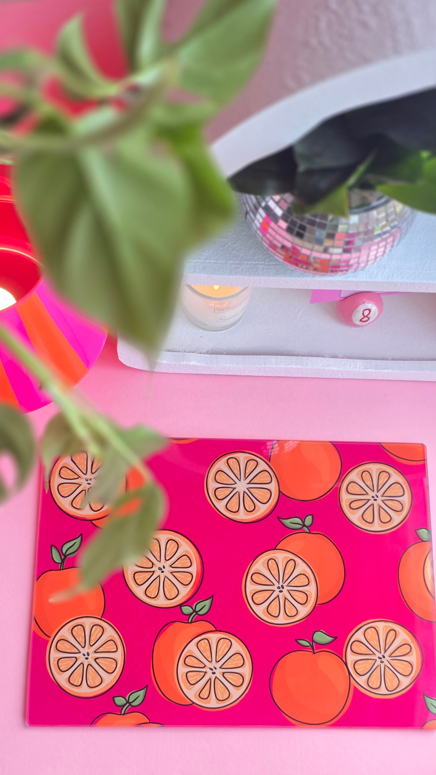 Fruity Oranges On Pink Glass Chopping Board