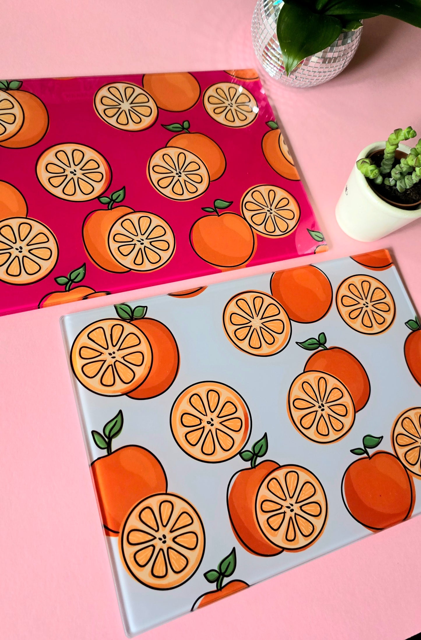 Fruity Oranges On Pink Glass Chopping Board