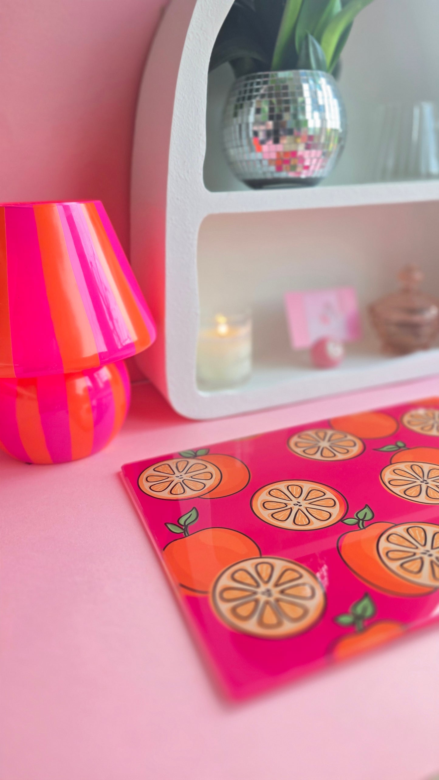 Fruity Oranges On Pink Glass Chopping Board