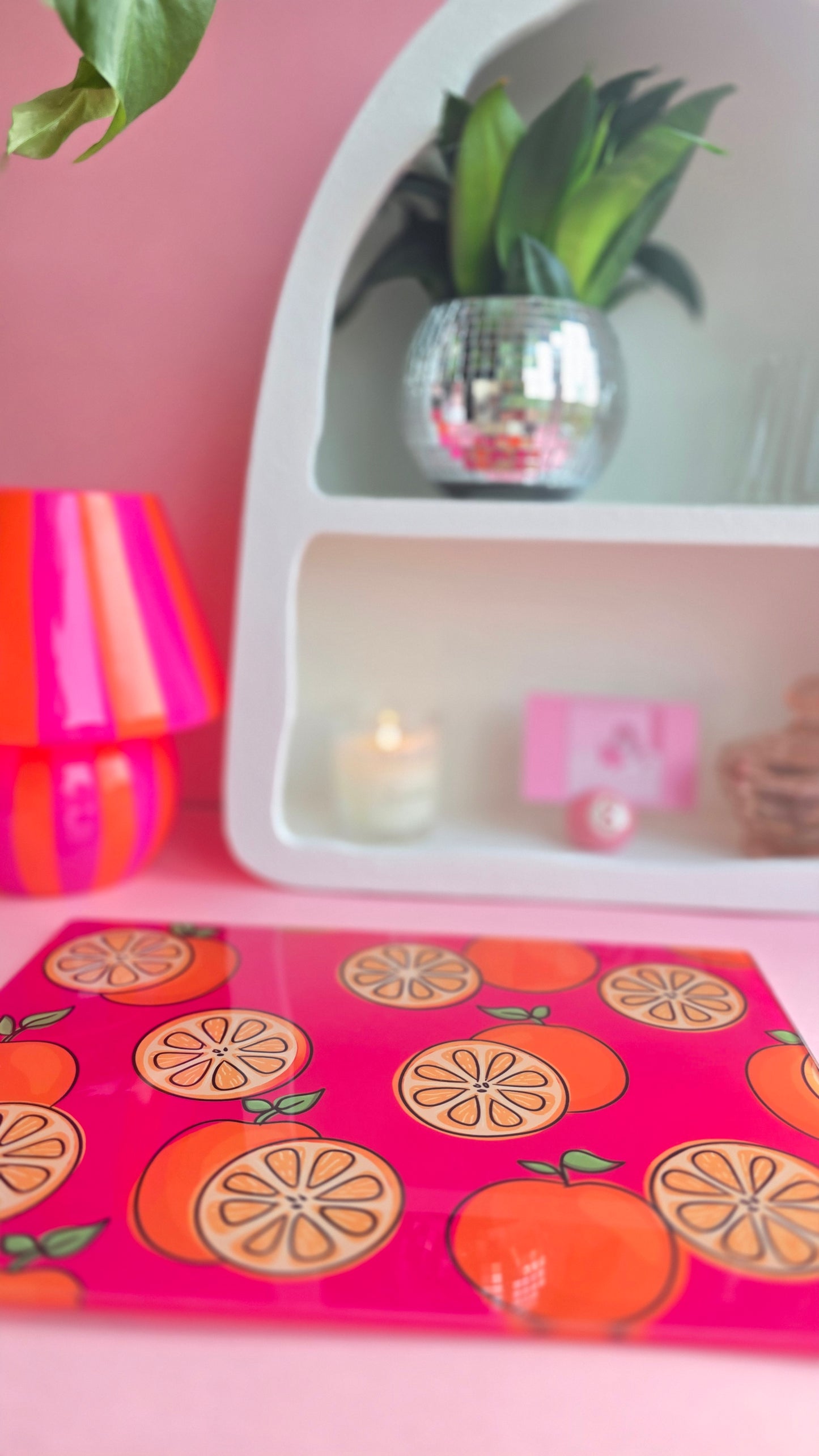 Fruity Oranges On Pink Glass Chopping Board